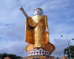 It is also known for its Standing Buddha temple. T It is also known for its Standing Buddha temple. The statue is about 60 feet high and is pointing toward the mountain of the town. You must visit the